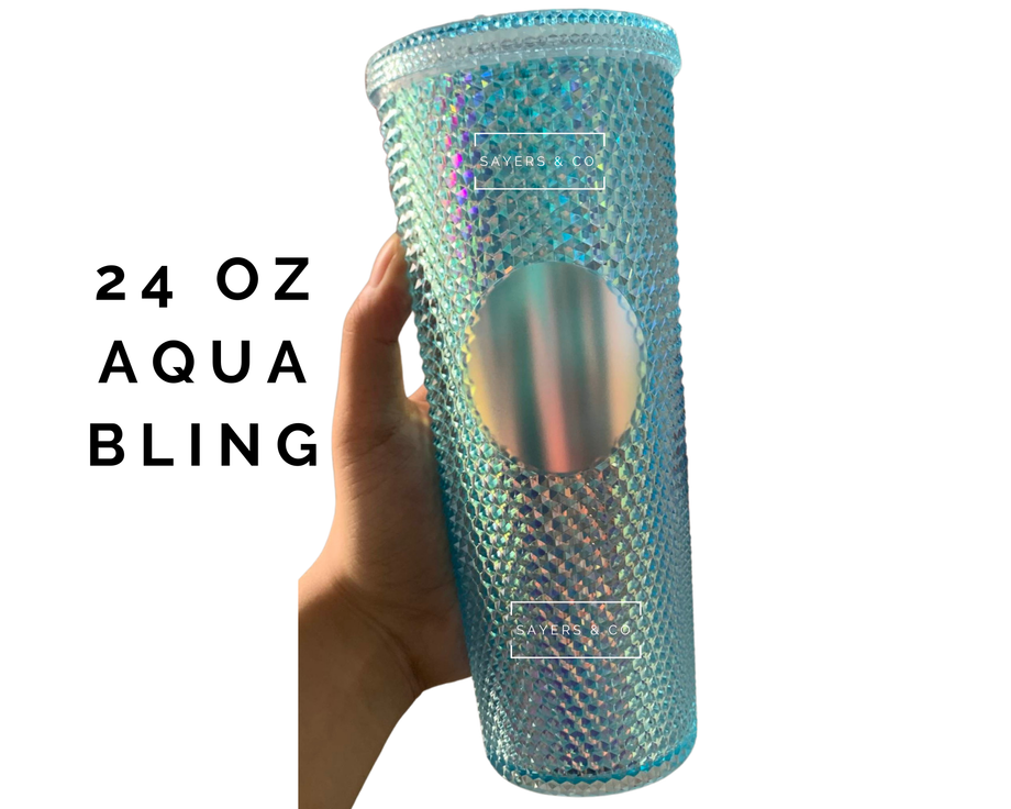 https://www.sayersandco.com/cdn/shop/products/24oz-Custom-Holiday-Scribble-Studded-Double-Walled-Tumbler-Aqua-Bling_460x@2x.png?v=1691546326