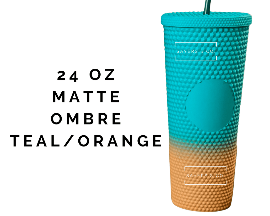 https://www.sayersandco.com/cdn/shop/products/24oz-Custom-Studded-Double-Walled-Tumbler-Matte-Ombre-Teal-Orange_460x@2x.png?v=1691543784
